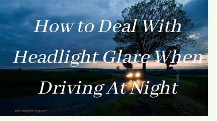 How do I reduce the glare on my oncoming headlights at night?
