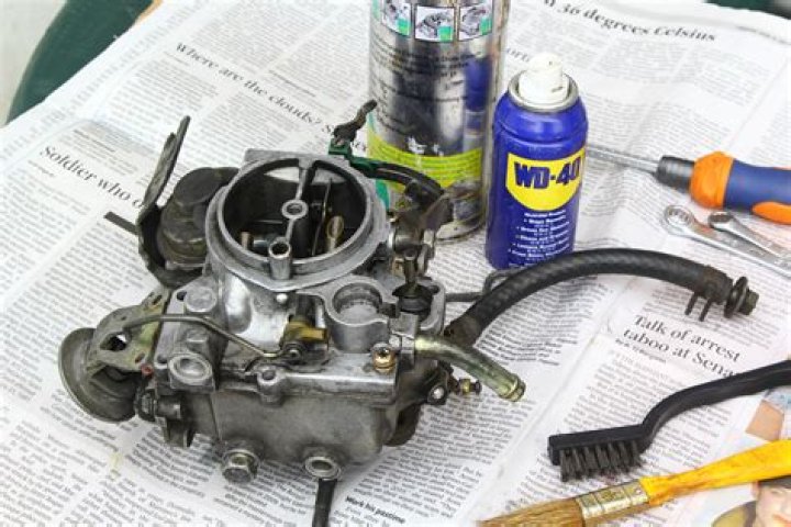 How do you clean a carburetor without removing it?