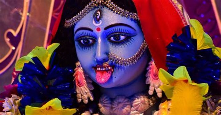 Why does Kali stick out her tongue?